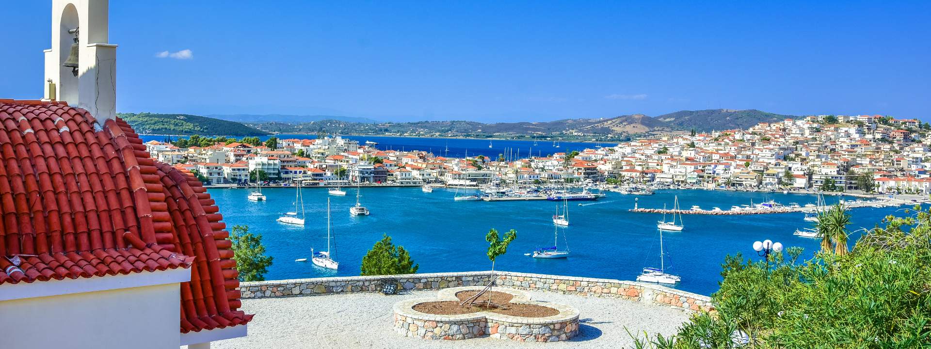 Explore the Greek Islands Aboard a Catamaran with Skipper and Hostess