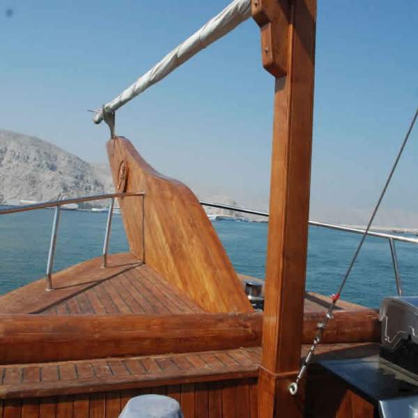 Sail aboard an elegant wooden yacht