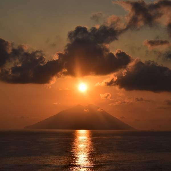 Watch the sunset over Stromboli
