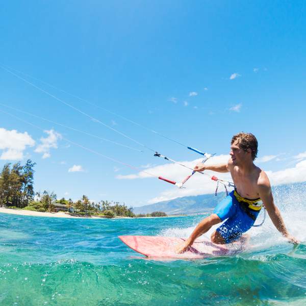 Try your hand at kitesurfing!