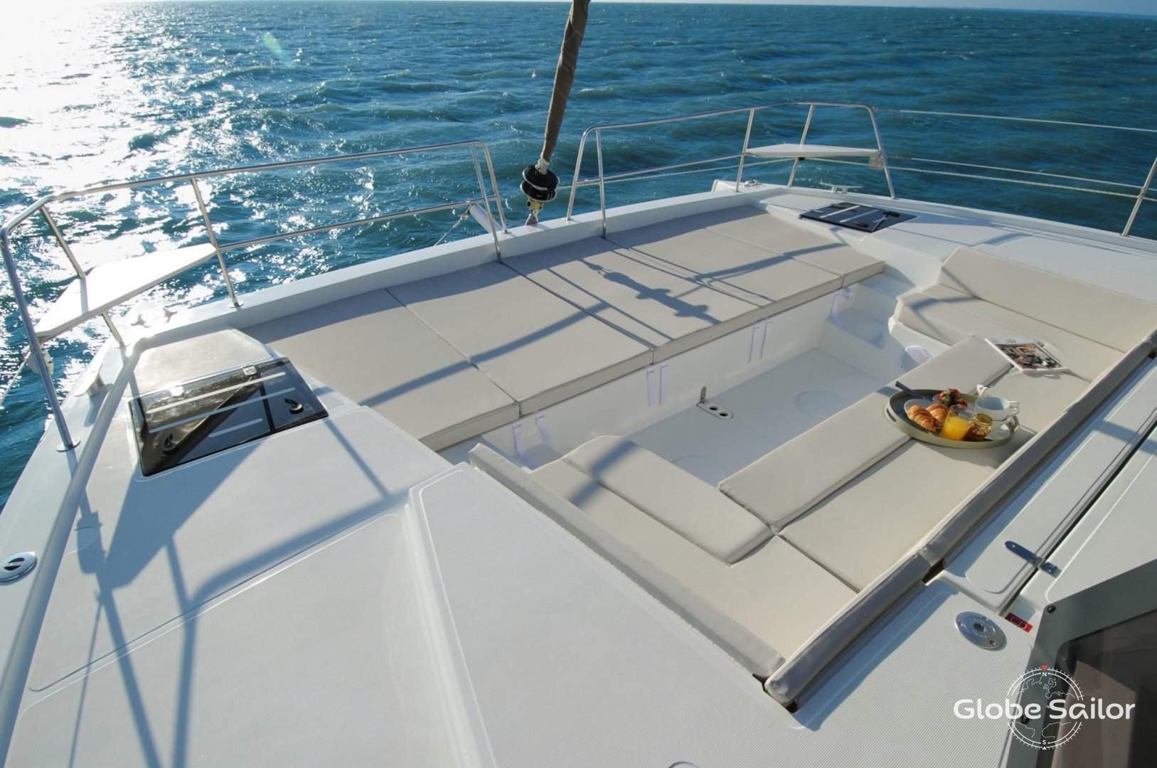 Relax at the front of your catamaran